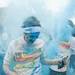 Runners toss powder in the air during the Ypsilanti Color Run on Saturday, May 11. Daniel Brenner I AnnArbor.com
